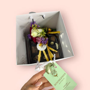 Ruby Callebaut  Chocolate  gift beautifully presented in white gift bag with fresh flowers -Bunchilicious Australia