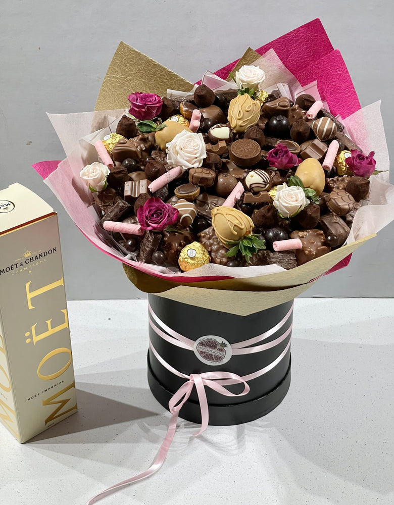 CHOCOLATE HEAVEN -CHOCOLATE BOUQUET Chocolate Bunchilicious Large Size In a Hat Box with champagne Moët 750ml + 4 strawberries dipped in chocolate 